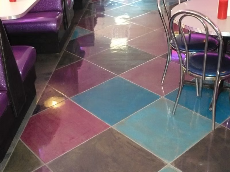 Multicolor dyed concrete floor in a diner