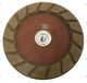 Round abrasive disc with brown surface and metal center 