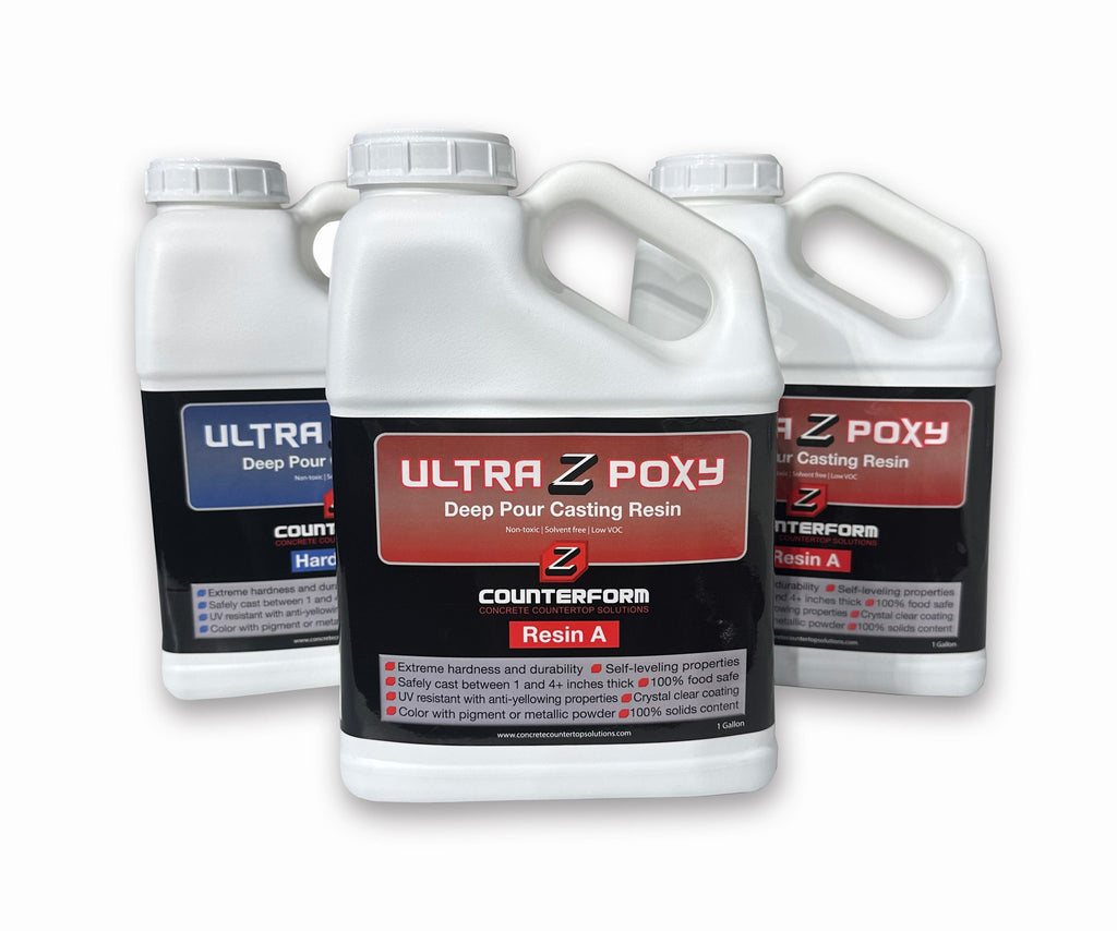 Three bottles of Ultra Z Poxy resin on a 