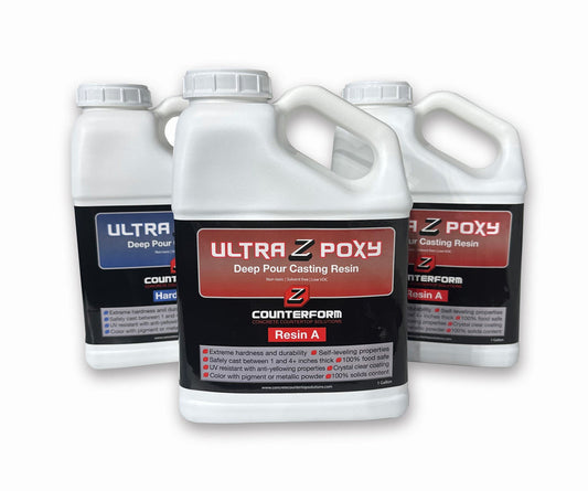 Three bottles of Ultra Z Poxy resin on a 